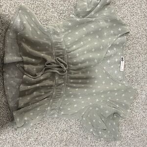 patterned green blouse